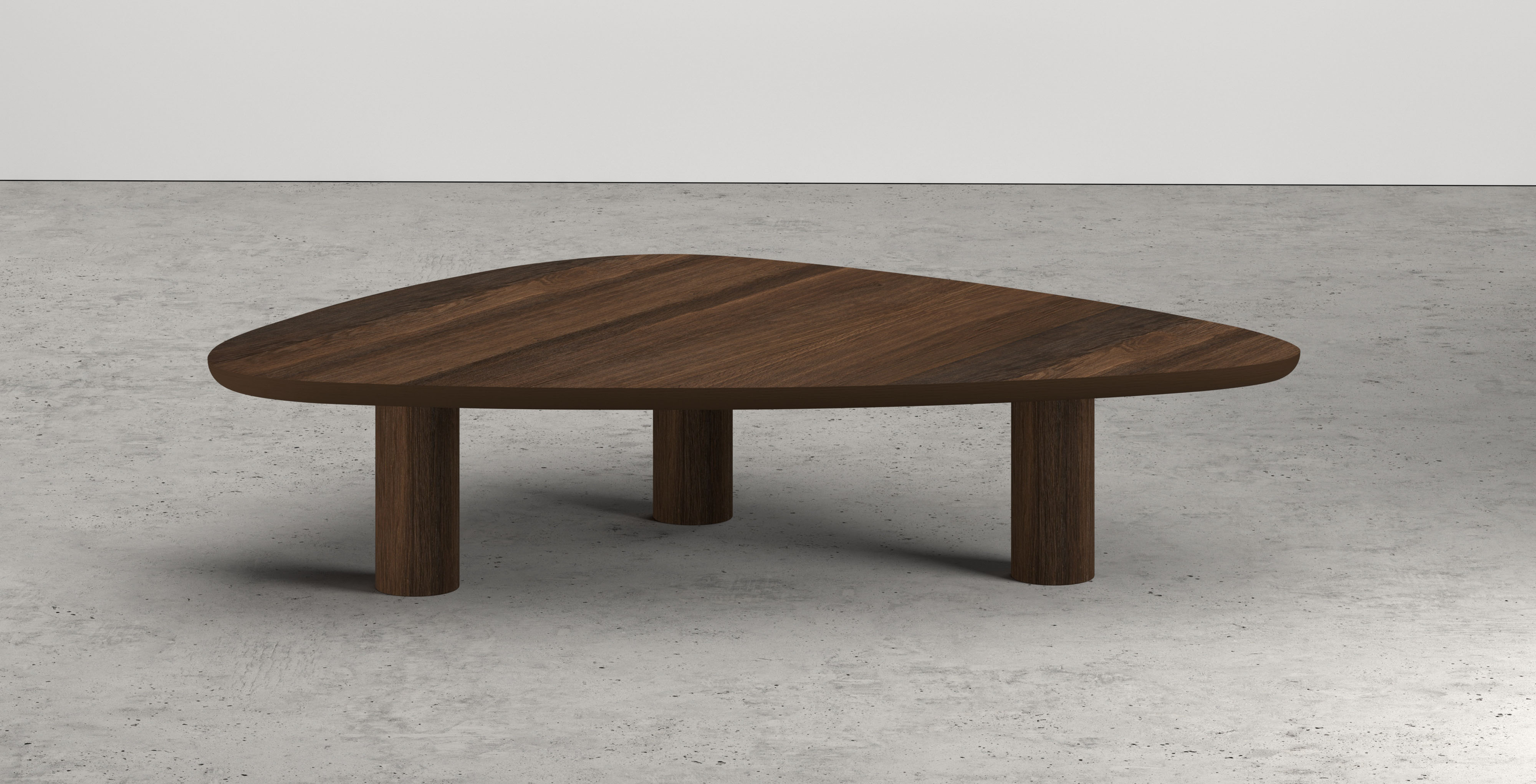 Salontafel Amato Rondo XSmall onderstel met plectrumvormig Amato blad in gerookte eik 140 x 115 x 34 cm
