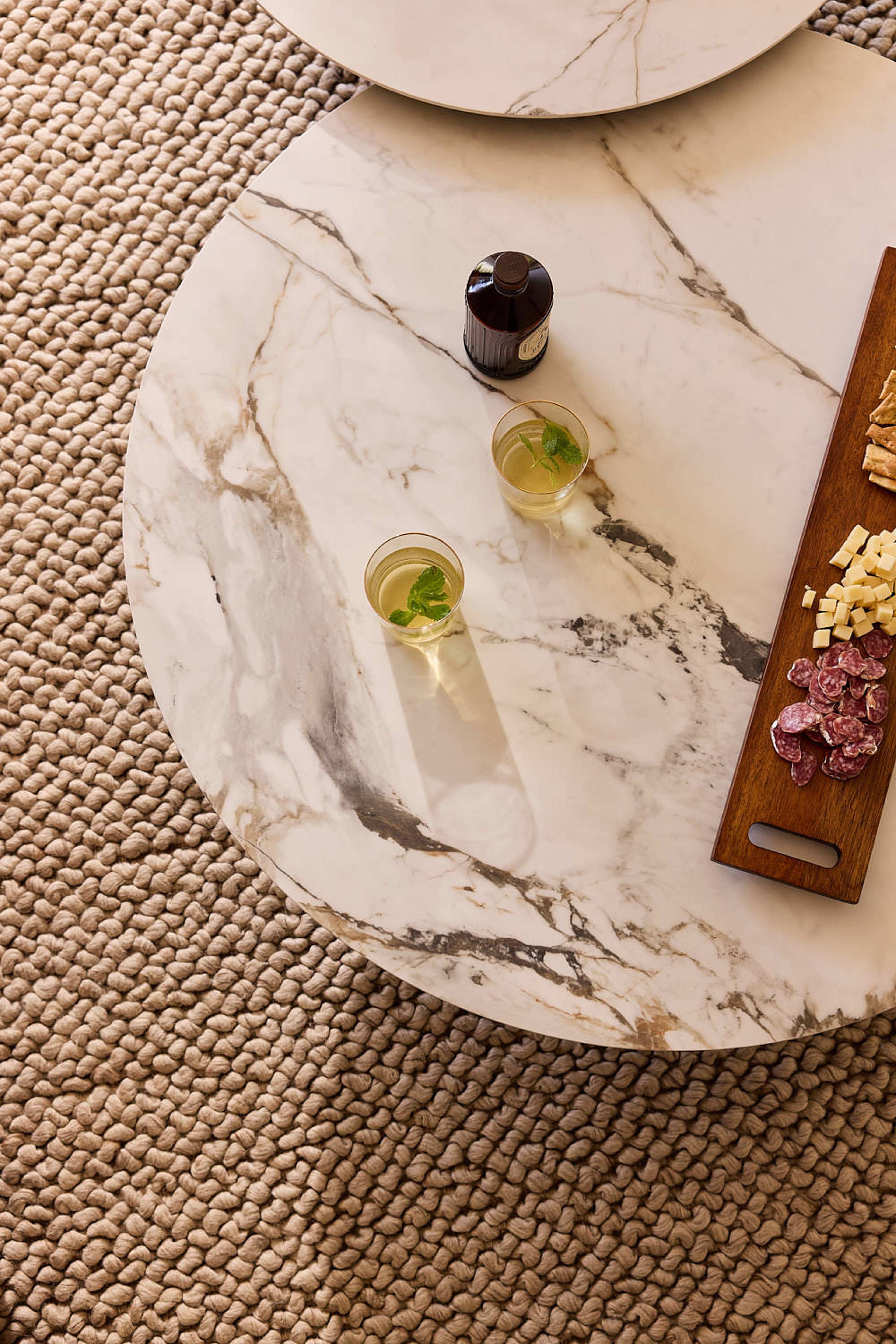 Salontafel Marzo onderstel zwart metaal met Ceramo blad keramiek in kleur Calacatta Luxe