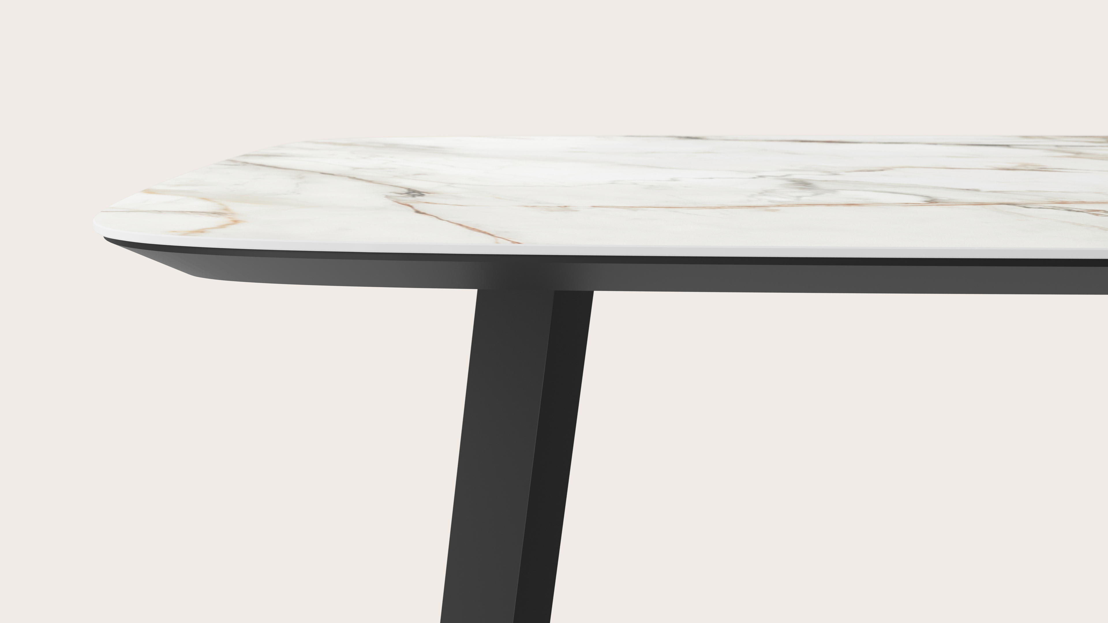 Table de salle à manger Clino armature en métal noir avec plateau Ceramo forme arrondi en céramique en couleur Calacatta Luxe  180 x 100 x 77 cm