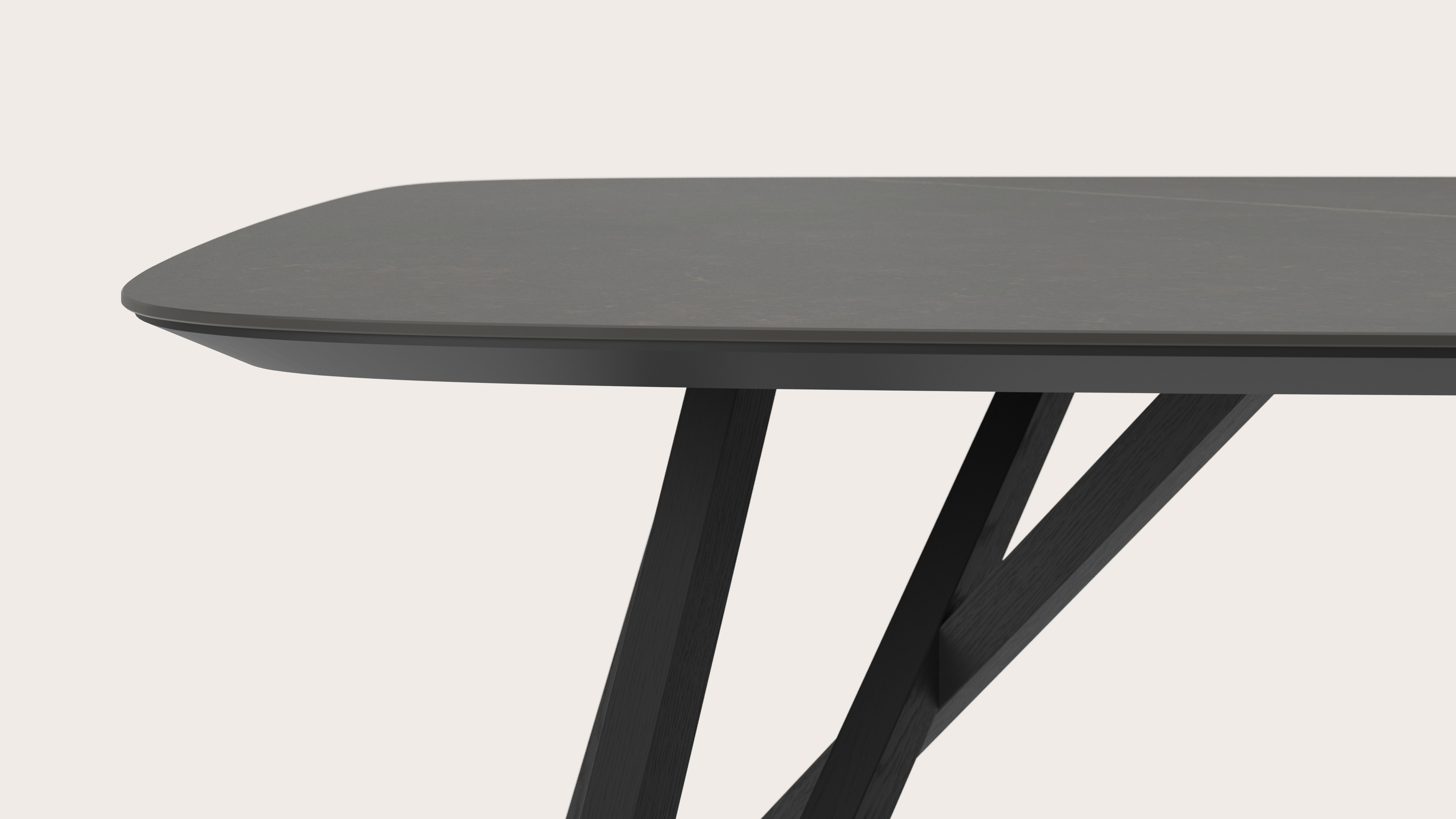Eettafel Ragno onderstel in zwarte eik met bootvormig volkeramisch Ceramo blad in kleur Calatorao 220 x 105 x 77 cm