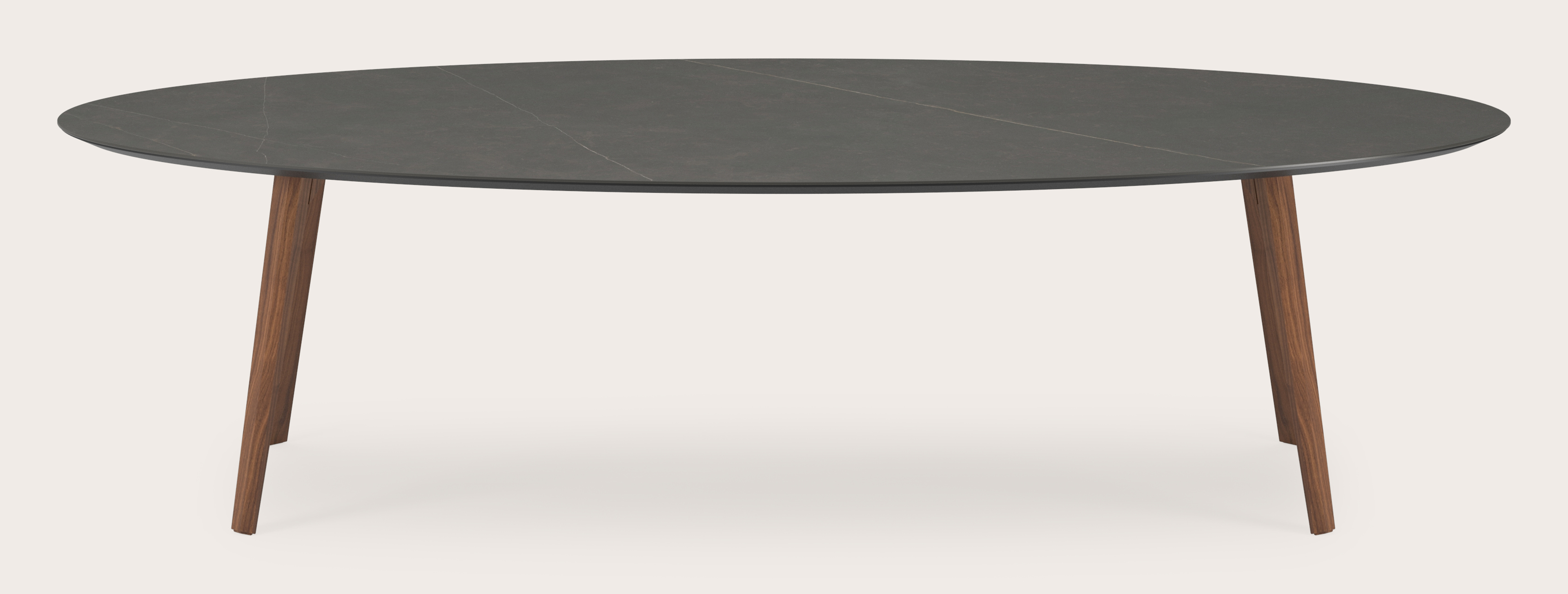 Eettafel Clino onderstel in walnoot met ovaal volkeramisch Ceramo blad in kleur Calatorao 300 x 140 x 77 cm