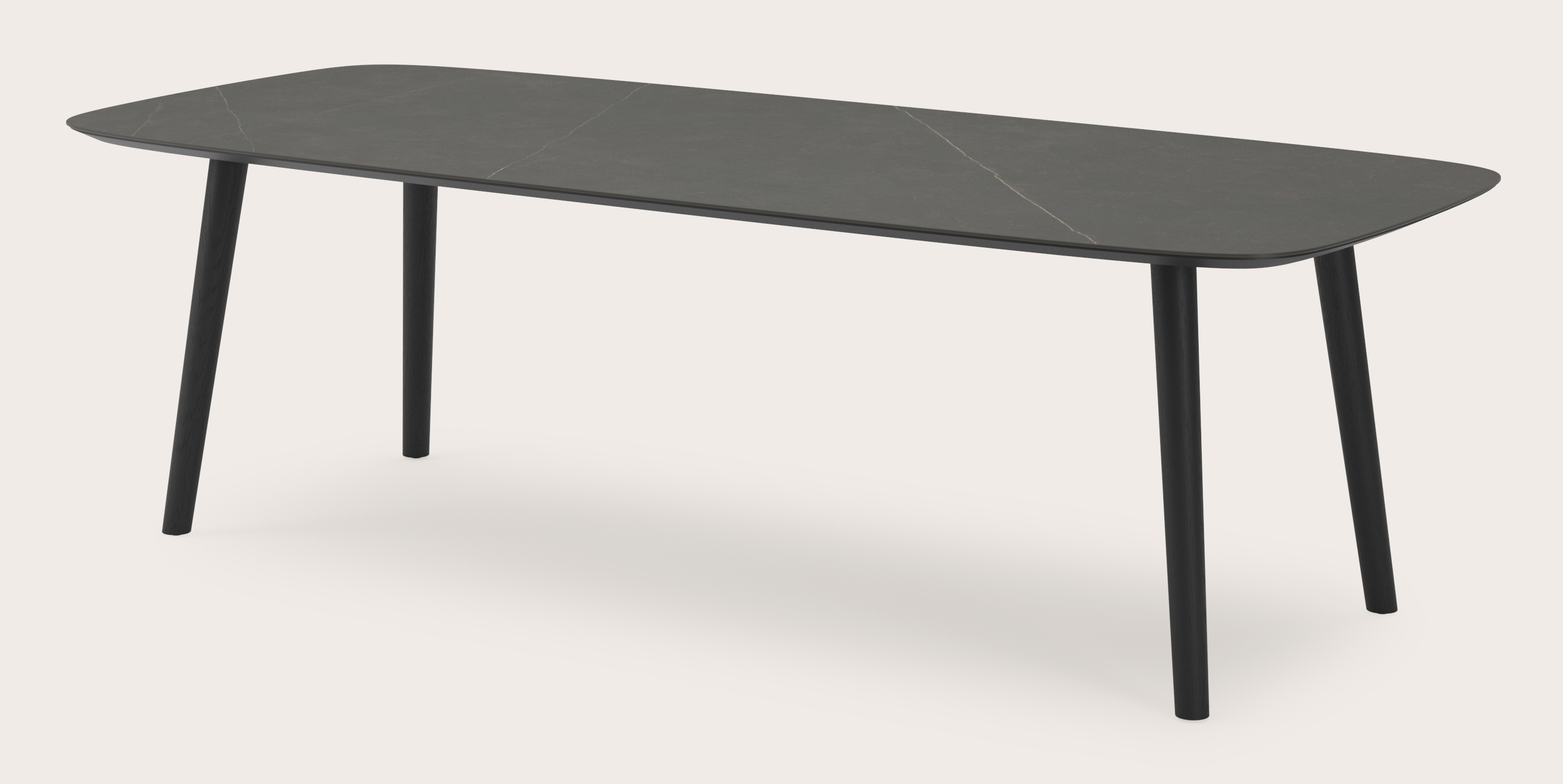 Eettafel Conico onderstel in zwarte eik met bootvormig volkeramisch Ceramo blad in kleur Calatorao 260 x 110 x 77 cm