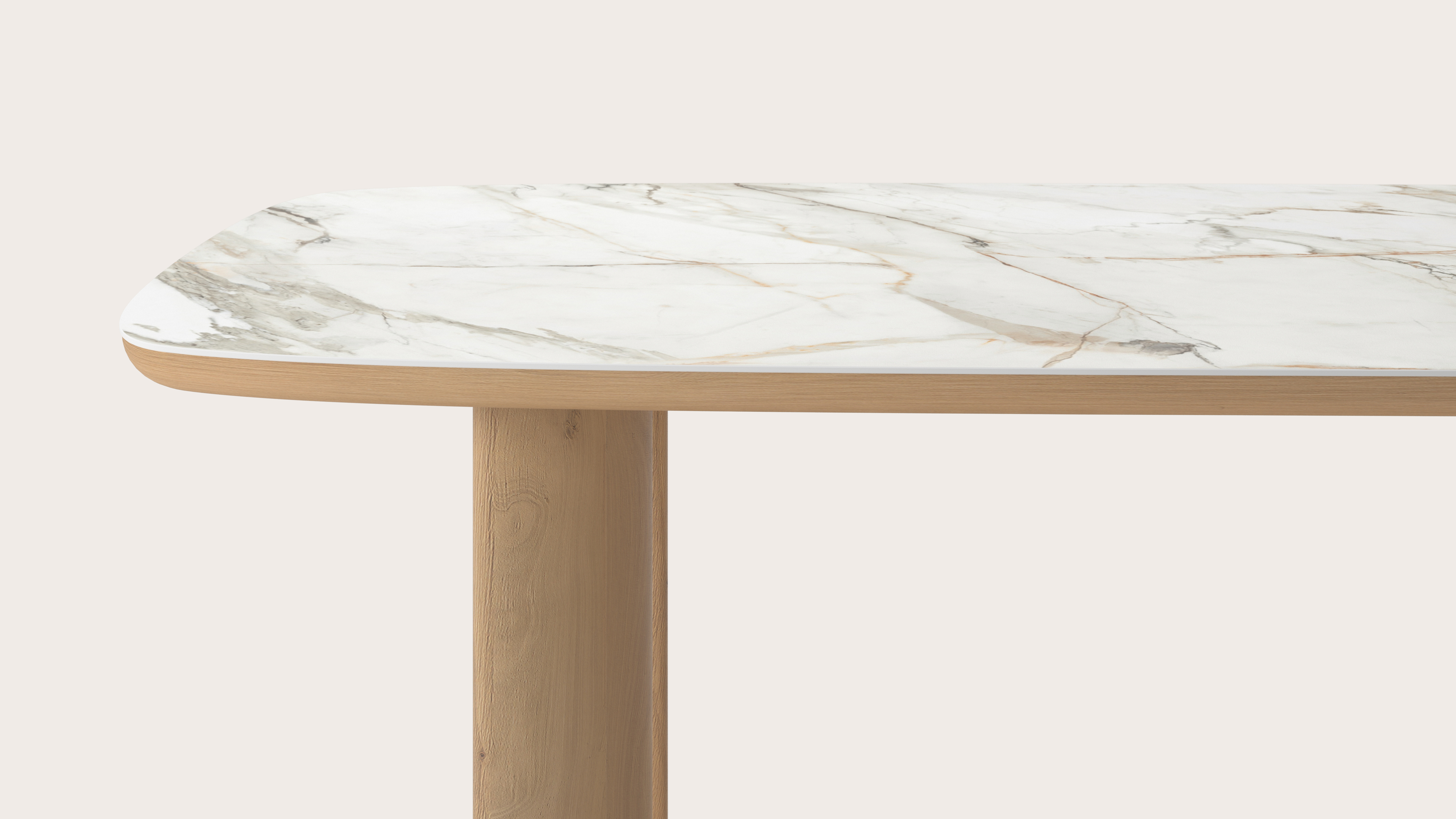Table de salle à manger Amato Ellipso armature en chêne couleur naturelleavec plateau Ceramo forme arrondie en céramique en couleur Calacatta Luxe 220 x 105 x 76 cm