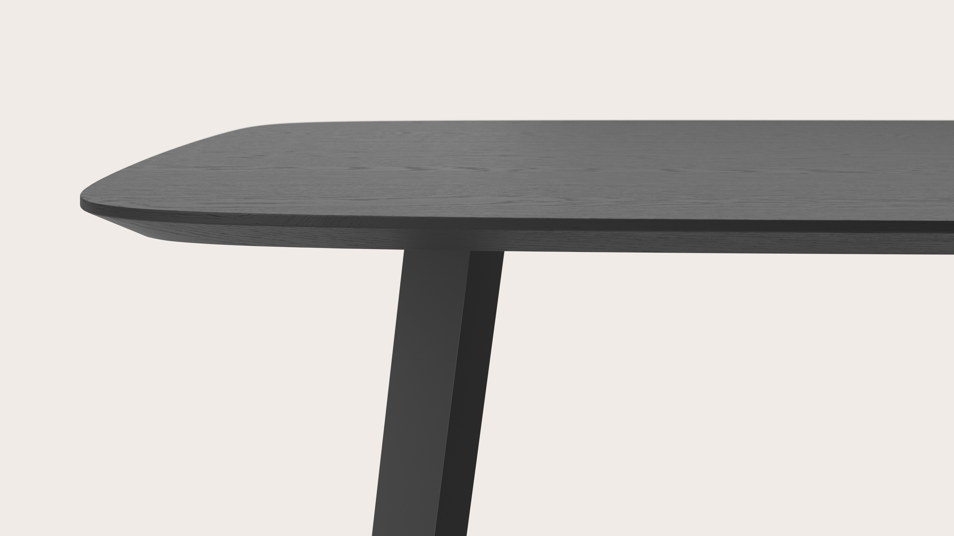 Eettafel Clino onderstel in zwart metaal met bootvormig Finesso blad in zwarte eik 180 x 100 x 77 cm