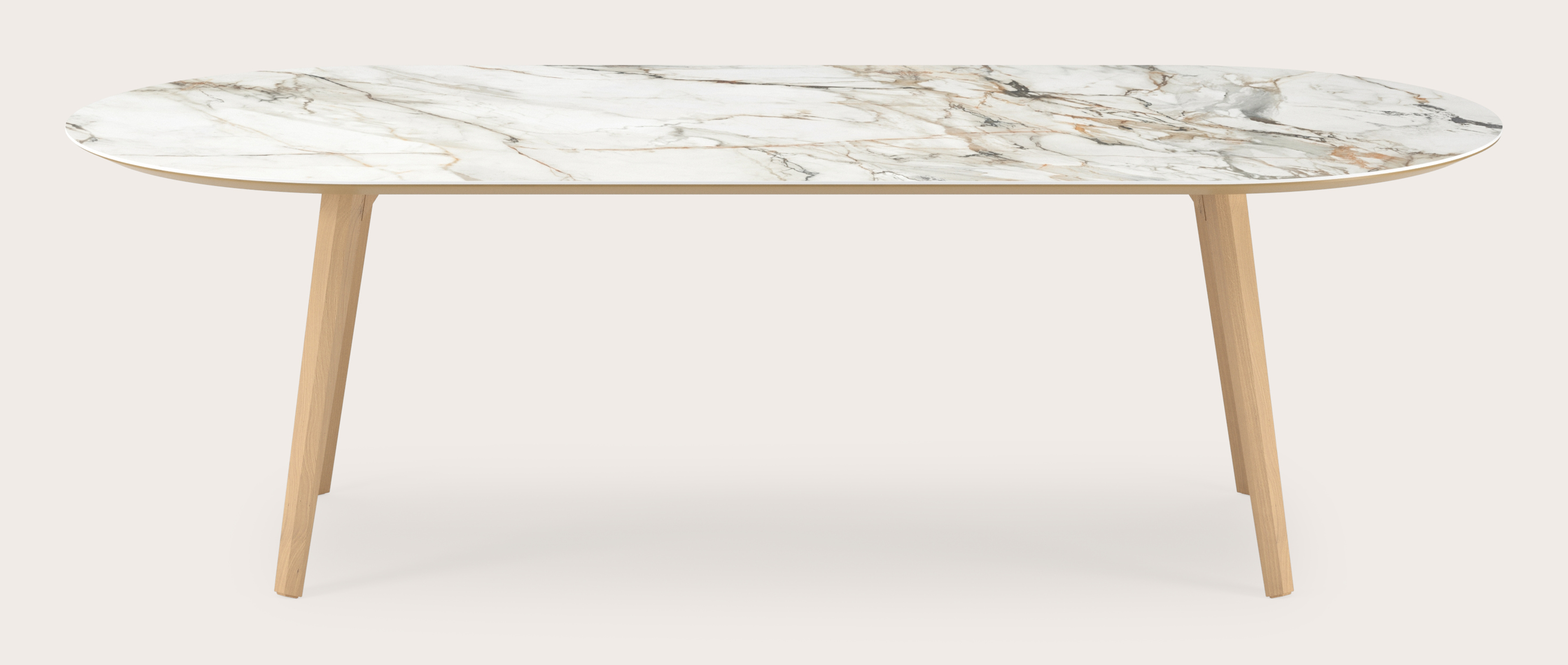 Eettafel Clino onderstel in natuurkleurige eik met plat ovaal volkeramisch Ceramo blad in kleur Calacatta Luxe 260 x 115 x 77 cm