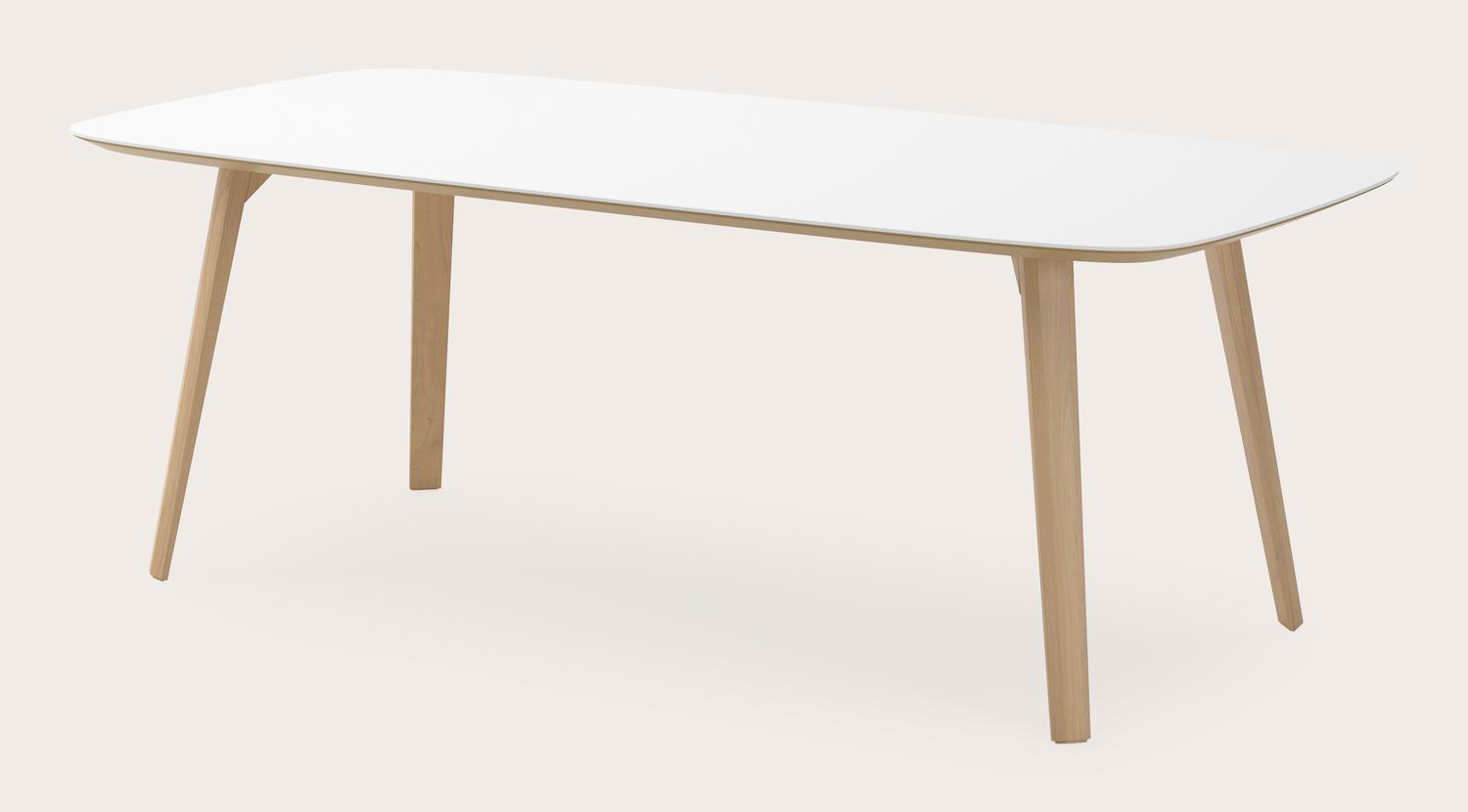 Eettafel Clino onderstel in natuurkleurige eik met bootvormig volkeramisch Ceramo blad in kleur Arctic White 220 x 105 x 77 cm