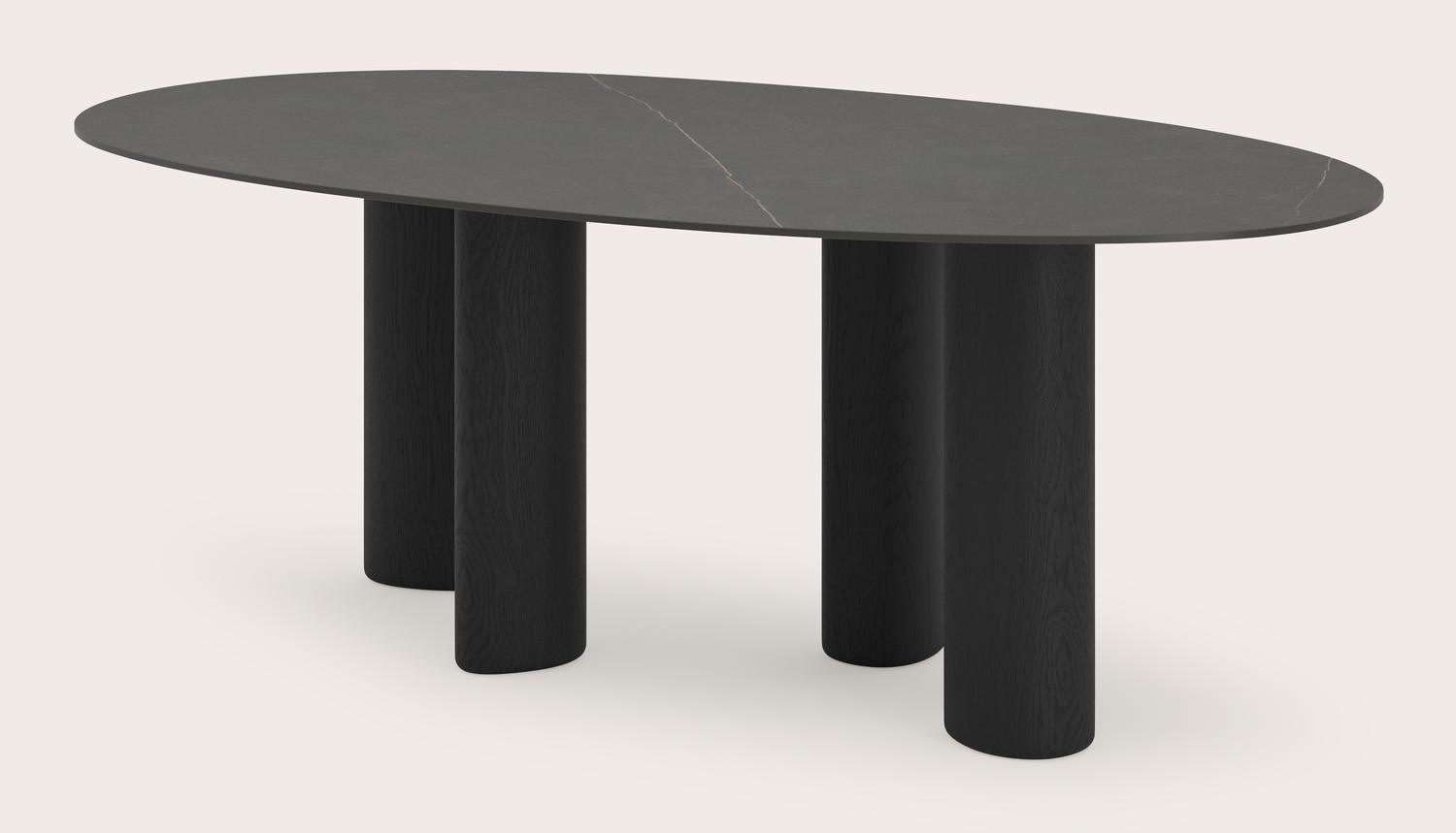Eettafel Volanto onderstel in zwarte eik met organisch ovaal volkeramisch Ceramo Lux eettafelblad in kleur Calatorao 220x125 cm